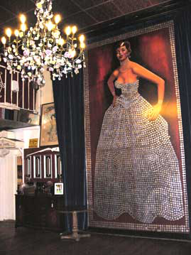Namesake of the hotel, the Silver Queen, clad in a dress made from silver dollars and on display in the saloon. (staff photo)